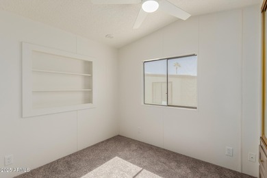 This property offers a great location in the Carriage Manor on Fountain of the Sun Country Club in Arizona - for sale on GolfHomes.com, golf home, golf lot