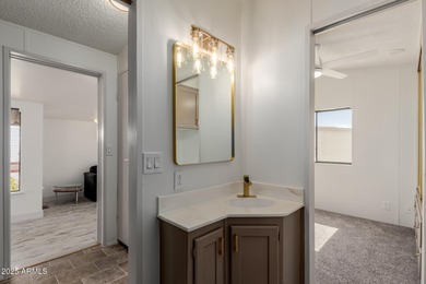 This property offers a great location in the Carriage Manor on Fountain of the Sun Country Club in Arizona - for sale on GolfHomes.com, golf home, golf lot