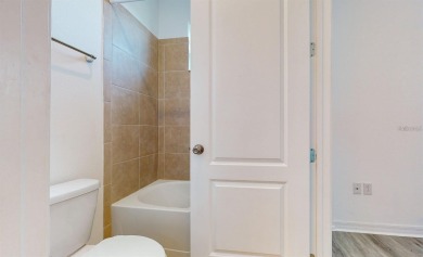 Seize the chance to own a stunning townhome in the highly on Eagle Creek Golf Club in Florida - for sale on GolfHomes.com, golf home, golf lot