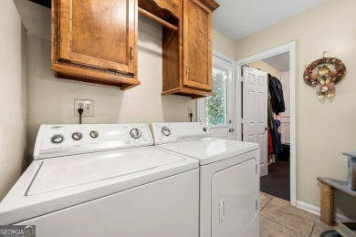 Welcome to your own private sanctuary in the heart of Newnan on Canongate On White Oak Golf Course in Georgia - for sale on GolfHomes.com, golf home, golf lot