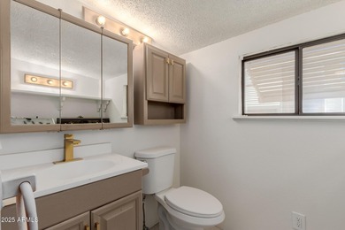 This property offers a great location in the Carriage Manor on Fountain of the Sun Country Club in Arizona - for sale on GolfHomes.com, golf home, golf lot