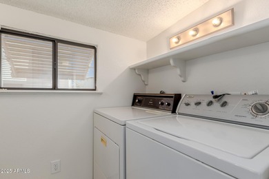 This property offers a great location in the Carriage Manor on Fountain of the Sun Country Club in Arizona - for sale on GolfHomes.com, golf home, golf lot