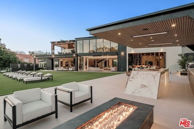 A Contemporary Sanctuary in TarzanaOverlooking the manicured on  in California - for sale on GolfHomes.com, golf home, golf lot