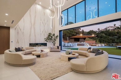 A Contemporary Sanctuary in TarzanaOverlooking the manicured on  in California - for sale on GolfHomes.com, golf home, golf lot