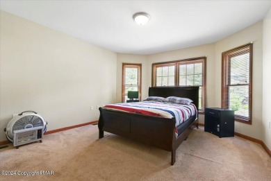 Step inside this 4-bed, 2.5 bath Colonial in the sought after on Country Club of the Poconos Golf Course in Pennsylvania - for sale on GolfHomes.com, golf home, golf lot