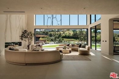 A Contemporary Sanctuary in TarzanaOverlooking the manicured on  in California - for sale on GolfHomes.com, golf home, golf lot