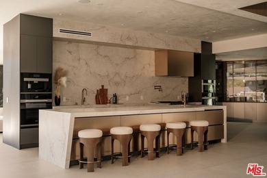 A Contemporary Sanctuary in TarzanaOverlooking the manicured on  in California - for sale on GolfHomes.com, golf home, golf lot