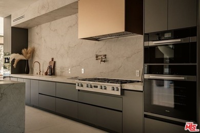 A Contemporary Sanctuary in TarzanaOverlooking the manicured on  in California - for sale on GolfHomes.com, golf home, golf lot