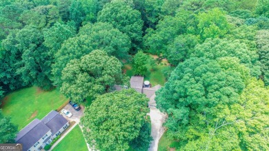 Welcome to your own private sanctuary in the heart of Newnan on Canongate On White Oak Golf Course in Georgia - for sale on GolfHomes.com, golf home, golf lot