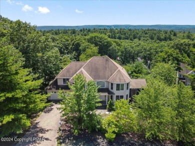 Step inside this 4-bed, 2.5 bath Colonial in the sought after on Country Club of the Poconos Golf Course in Pennsylvania - for sale on GolfHomes.com, golf home, golf lot