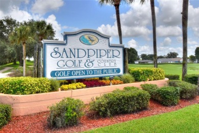 Welcome to this stunning two-bedroom, two-bathroom home with on Sandpiper Golf Club in Florida - for sale on GolfHomes.com, golf home, golf lot