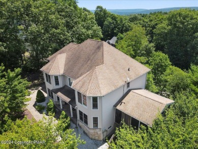 Step inside this 4-bed, 2.5 bath Colonial in the sought after on Country Club of the Poconos Golf Course in Pennsylvania - for sale on GolfHomes.com, golf home, golf lot