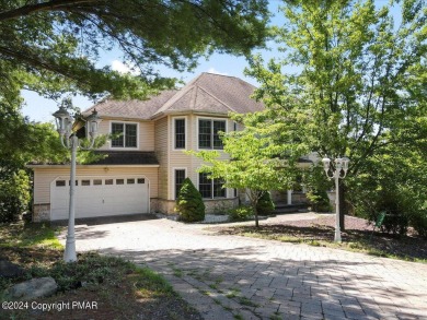 Step inside this 4-bed, 2.5 bath Colonial in the sought after on Country Club of the Poconos Golf Course in Pennsylvania - for sale on GolfHomes.com, golf home, golf lot