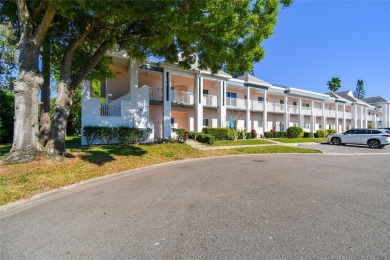 Stunning End-Unit Condo with Pond Views in a Vibrant 55+ on On Top Of The World Golf Course in Florida - for sale on GolfHomes.com, golf home, golf lot
