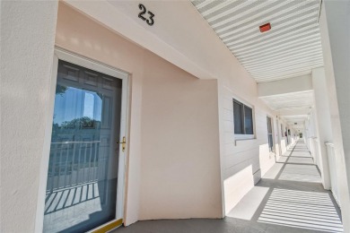 Stunning End-Unit Condo with Pond Views in a Vibrant 55+ on On Top Of The World Golf Course in Florida - for sale on GolfHomes.com, golf home, golf lot