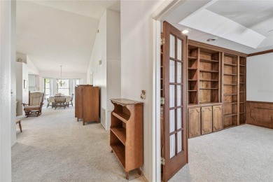 Stunning End-Unit Condo with Pond Views in a Vibrant 55+ on On Top Of The World Golf Course in Florida - for sale on GolfHomes.com, golf home, golf lot