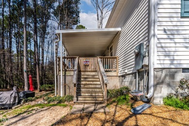 A MUST SEE! Charming 2-Bedroom, 2-Bathroom Cottage in the Gated on River Golf and Country Club at Lake Royale in North Carolina - for sale on GolfHomes.com, golf home, golf lot