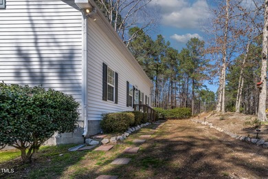 A MUST SEE! Charming 2-Bedroom, 2-Bathroom Cottage in the Gated on River Golf and Country Club at Lake Royale in North Carolina - for sale on GolfHomes.com, golf home, golf lot