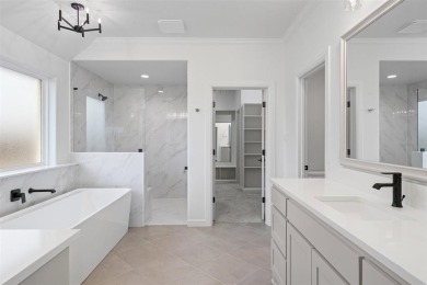 Welcome to this stunning Modified St. Lucie Classic Series home on Nutcracker Golf Club in Texas - for sale on GolfHomes.com, golf home, golf lot