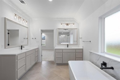 Welcome to this stunning Modified St. Lucie Classic Series home on Nutcracker Golf Club in Texas - for sale on GolfHomes.com, golf home, golf lot
