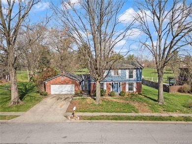 Situated on the 16th hole of Elk Run Golf Course, this spacious on Jeffersonville Elks Golf Club in Indiana - for sale on GolfHomes.com, golf home, golf lot