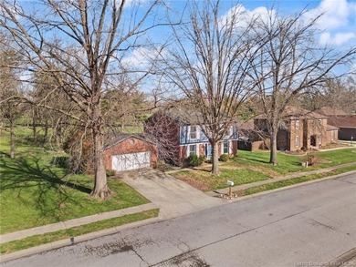 Situated on the 16th hole of Elk Run Golf Course, this spacious on Jeffersonville Elks Golf Club in Indiana - for sale on GolfHomes.com, golf home, golf lot