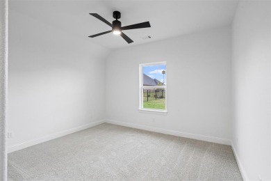 Welcome to this stunning Modified St. Lucie Classic Series home on Nutcracker Golf Club in Texas - for sale on GolfHomes.com, golf home, golf lot