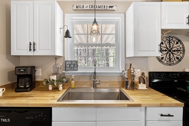 A MUST SEE! Charming 2-Bedroom, 2-Bathroom Cottage in the Gated on River Golf and Country Club at Lake Royale in North Carolina - for sale on GolfHomes.com, golf home, golf lot