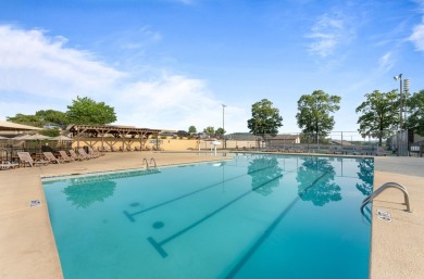 Discover resort-style living in this beautiful  2-bedroom on Pointe Royale Village Country Club in Missouri - for sale on GolfHomes.com, golf home, golf lot