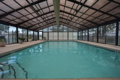 Discover resort-style living in this beautiful  2-bedroom on Pointe Royale Village Country Club in Missouri - for sale on GolfHomes.com, golf home, golf lot