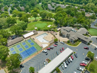 Discover resort-style living in this beautiful  2-bedroom on Pointe Royale Village Country Club in Missouri - for sale on GolfHomes.com, golf home, golf lot