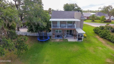 MOTIVATED SELLERWelcome to this charming 4-bedroom, 2.5-bathroom on Panama Country Club in Florida - for sale on GolfHomes.com, golf home, golf lot