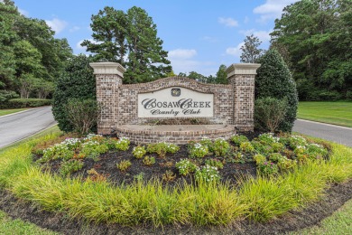 Nestled within the prestigious and serene gated community of on Coosaw Creek Country Club in South Carolina - for sale on GolfHomes.com, golf home, golf lot