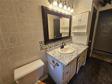 This charming 3-bedroom, 2-bath home offers the potential to add on Wedgewood Cove Golf Club in Minnesota - for sale on GolfHomes.com, golf home, golf lot