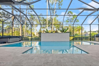 Absolutely exquisite, one-of-a-kind, 2023 custom-built luxury on Plantation Bay Golf and Country Club in Florida - for sale on GolfHomes.com, golf home, golf lot