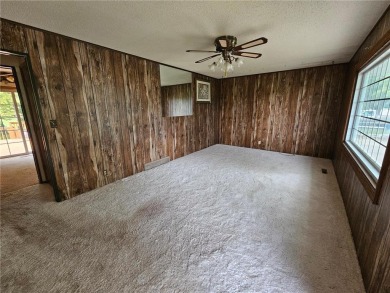 This charming 3-bedroom, 2-bath home offers the potential to add on Wedgewood Cove Golf Club in Minnesota - for sale on GolfHomes.com, golf home, golf lot