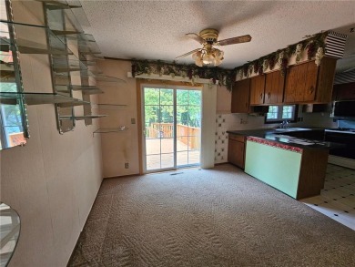This charming 3-bedroom, 2-bath home offers the potential to add on Wedgewood Cove Golf Club in Minnesota - for sale on GolfHomes.com, golf home, golf lot
