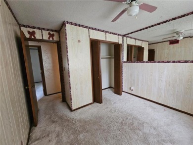 This charming 3-bedroom, 2-bath home offers the potential to add on Wedgewood Cove Golf Club in Minnesota - for sale on GolfHomes.com, golf home, golf lot