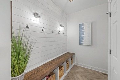 Exquisite style meets modern luxury in this stunning golf course on Coosaw Creek Country Club in South Carolina - for sale on GolfHomes.com, golf home, golf lot