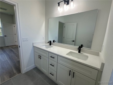 Discover this stunning, brand-new home in Citrus Springs on Citrus Springs Country Club in Florida - for sale on GolfHomes.com, golf home, golf lot
