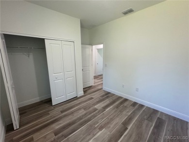 Discover this stunning, brand-new home in Citrus Springs on Citrus Springs Country Club in Florida - for sale on GolfHomes.com, golf home, golf lot