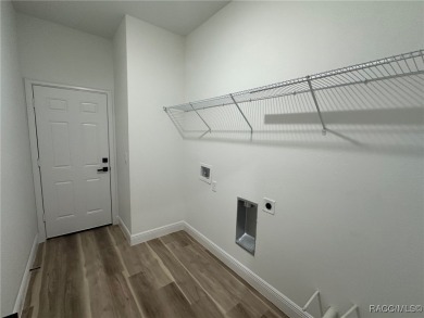 Discover this stunning, brand-new home in Citrus Springs on Citrus Springs Country Club in Florida - for sale on GolfHomes.com, golf home, golf lot
