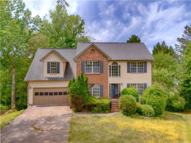 PRIME LOCATION! Beautiful traditional-style single-family home on TPC At Sugarloaf Golf Club in Georgia - for sale on GolfHomes.com, golf home, golf lot