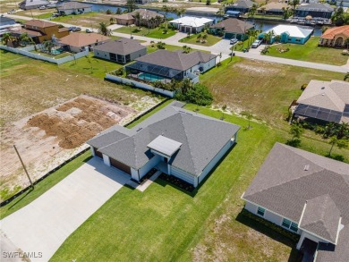 Newer home. 3 beds, 3.5 baths, and a 3-car garage. High 12' flat on Burnt Store Golf Club in Florida - for sale on GolfHomes.com, golf home, golf lot