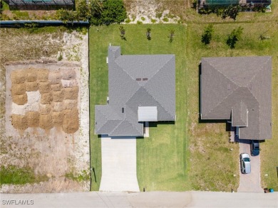 Newer home. 3 beds, 3.5 baths, and a 3-car garage. High 12' flat on Burnt Store Golf Club in Florida - for sale on GolfHomes.com, golf home, golf lot