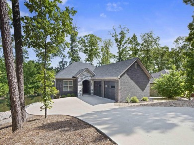 Live your best lake life in this stunning all-brick home on Lake on Isabella Golf Course  in Arkansas - for sale on GolfHomes.com, golf home, golf lot
