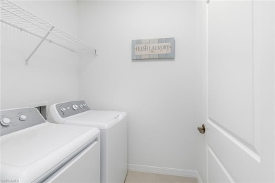 Beautiful 3 Bedroom Villa in The Groves at Orange Blossom! This on Valencia Golf and Country Club in Florida - for sale on GolfHomes.com, golf home, golf lot