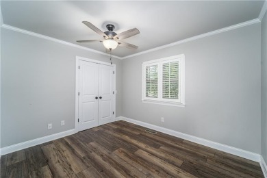 Welcome to 1472 S River Oaks, a beautifully updated 3 bedroom, 2 on Okefenokee Country Club in Georgia - for sale on GolfHomes.com, golf home, golf lot