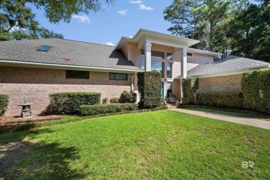 Check out this amazing, modern home nestled in this quiet cul de on Lake Forest Yacht and Country Club in Alabama - for sale on GolfHomes.com, golf home, golf lot