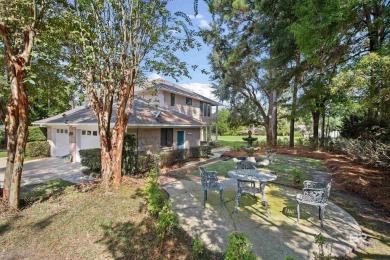 Check out this amazing, modern home nestled in this quiet cul de on Lake Forest Yacht and Country Club in Alabama - for sale on GolfHomes.com, golf home, golf lot